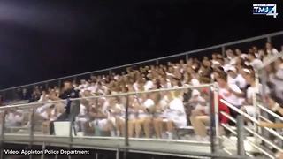 Wisconsin officer going viral for leading student section at high school football game