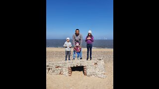 Adorable children have some fun time at the seaside