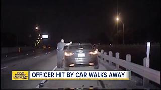 WATCH: Car plows into police officer during traffic stop