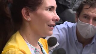 Family member speaks at family reunification center