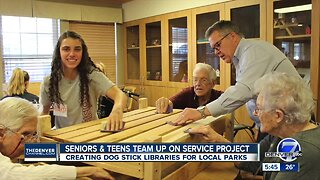 Seniors & students making stick libraries for dogs