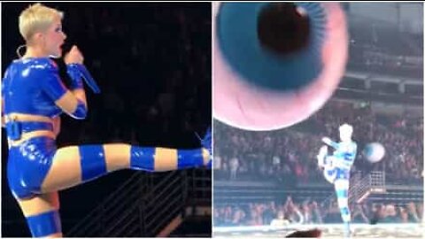 Katy Perry renvoie accidentellement une balle en plein visage d'un fan!