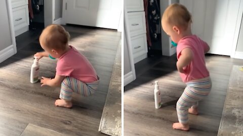 Baby Hilariously Pretends To Apply Lotion The Same Way Mom Does