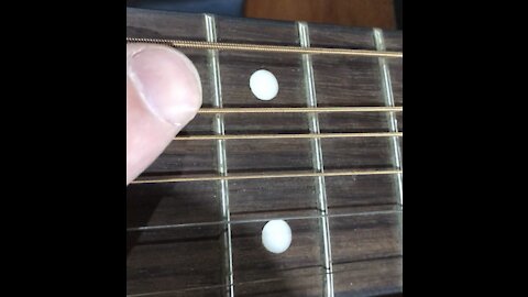 Inspecting guitar teeth aka frets for string damage, and also horse teeth