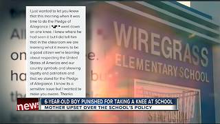 6-year-old boy told to stand after taking a knee at school