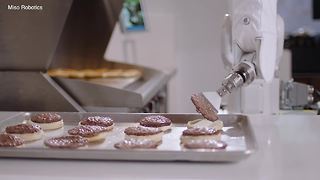 This robotic arm is designed to flip burgers