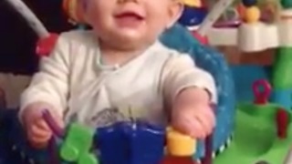 Hilarious expression of baby using Bouncy Toy