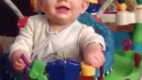 Hilarious expression of baby using Bouncy Toy