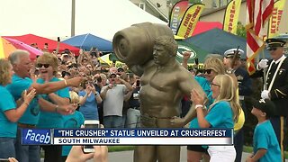 Thousands gather for unveiling of 'Da Crusher' statue