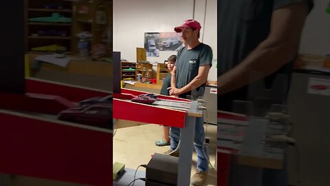 Mechanic Co-workers pair off at the Slot Car Drags
