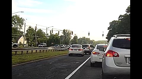 Guy holds up left turn lane because he is more important.