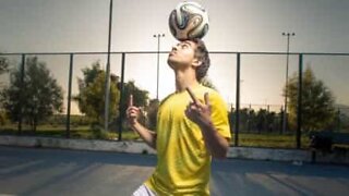 Man scores a bucket while doing a handstand