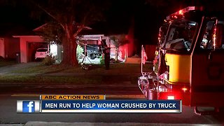 Men run to help woman crushed by truck