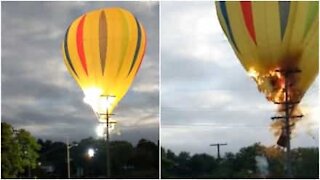 Mongolfiera sbatte contro cavi elettrici