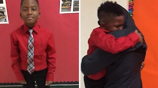 Little boy in tears after surprise reunion with older brother