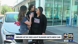 Driver hit by red light runner, saving family, receives new car