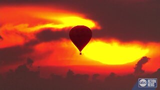 Hot air balloon floats over Pasco County sunrise