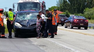 Raw video: Woman taken into custody at crash scene