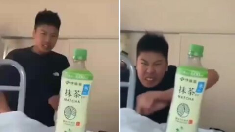 Boy fails to open bottle cap with his back kick and hurt himself