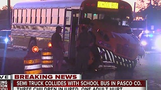 School bus and semi-truck collide in Pasco, children hurt