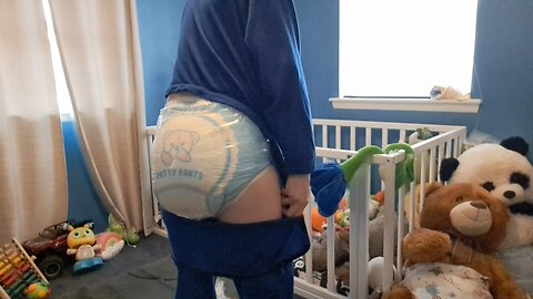 Adult baby in pajamas with a butt flap for ABDL diaper checks