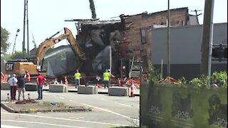 Crews demolish building damaged by underground issue in southwest Detroit