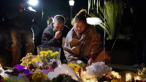 People gather at Monterey Park City Hall to celebrate the lives lost