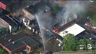 Large fire spreads across downtown Holly