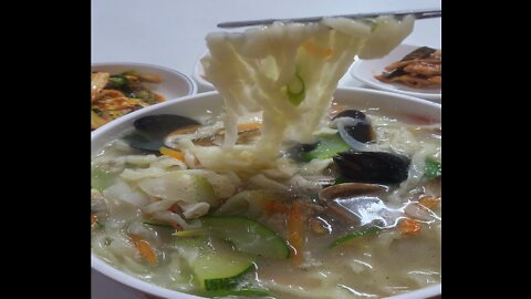 Korean style Sea food hand-shake flour dough noodle soup 수타 해물칼국수