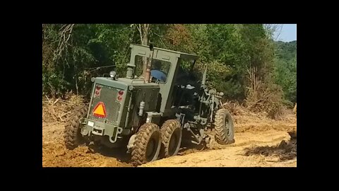 Road grader in action & Kioti NX6010 disking mile long driveway-Illinois land