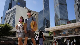 Hong Kong To Tighten COVID-19 Rules, Hopes China Reopens