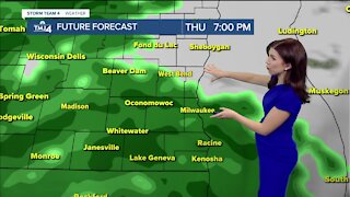 Cloudy and breezy with scattered showers Thursday