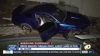 Car nearly lands in backyard swimming pool