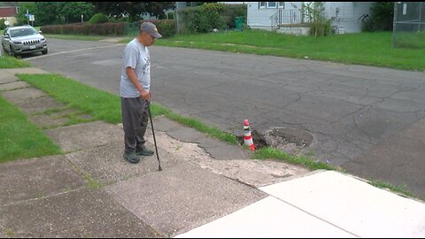 Buffalo homeowner learns he's responsible for fixing a sinkhole in the street outside his home