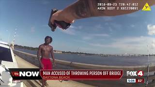 Florida man throws bicycle, then other man off bridge
