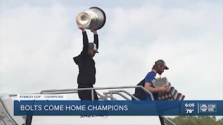 Bolts touch down Tampa Int'l Airport after winning Stanley Cup