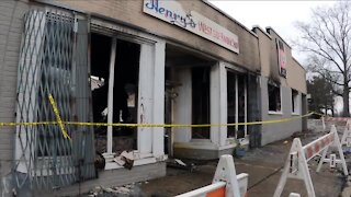 Fire damages Akron building housing unopened restaurant, uninsured barbershop