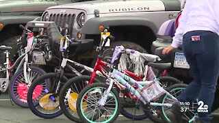 Black Jeepers of the DMV pass out bikes to kids in public housing