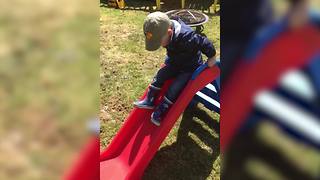 Tot Boy Gets Stuck In A Slide