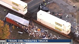 WATCH: Big rig struck by train in Georgia