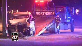 Woman hospitalized after crashing SUV