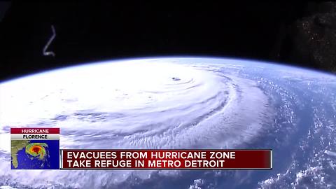 People fly to Detroit's Metro Airport from the Carolinas to escape Hurricane Florence