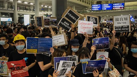 Anti-Extradition Bill Protesters Occupy Hong Kong Airport