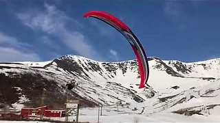 Paraglider gatecrashes ski goers lunch || Viral Video UK