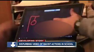 Unlicensed adult fired, students disciplined after video of racial slur written on computer