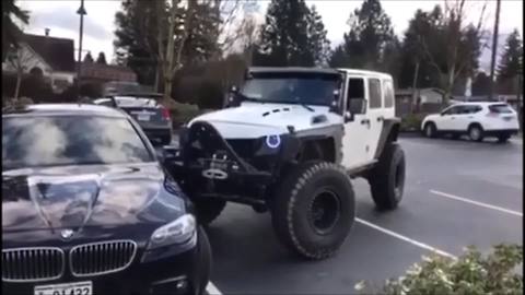 Jeep Gives Poorly Parked BMW Push In The Right Direction