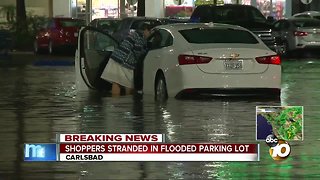 Drivers stranded as rain floods Carlsbad shopping center