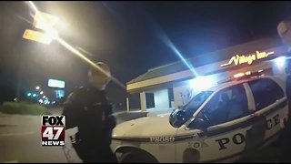 Woman steels police car