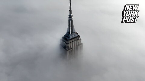 Empire State Building swallowed up by thick fog: drone video