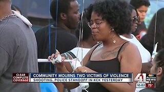 Community mourns death 2 people killed at KCK deli at vigil